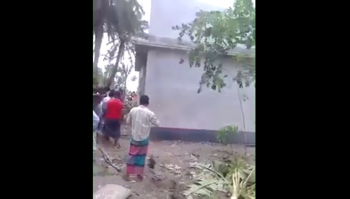 house submerged in water