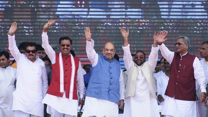 shah addressing rally