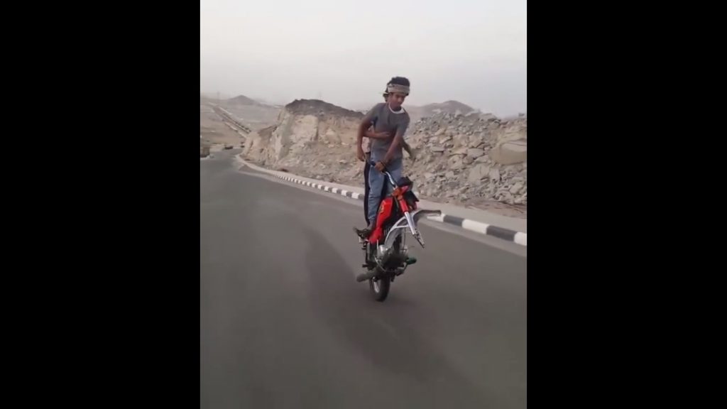 Crazy Guys Ride a Motorcycle Without Front Wheel