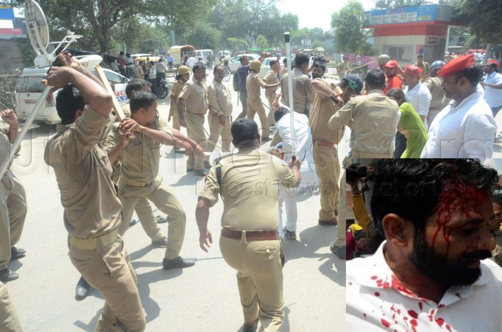 sp activist arrested after lathicharge