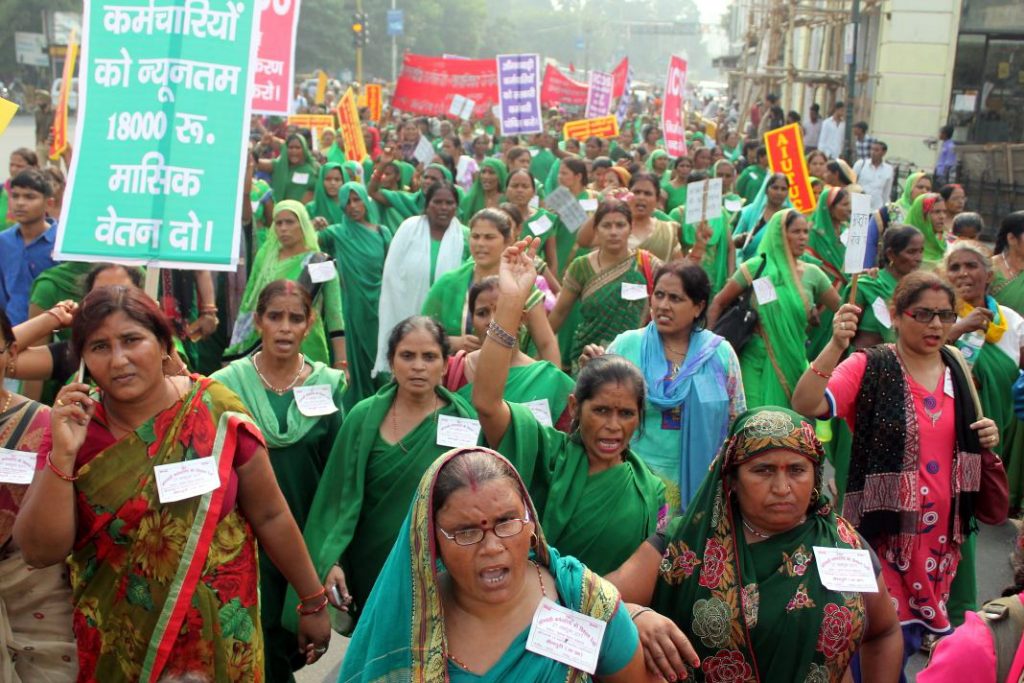 Anganwadi activists march past