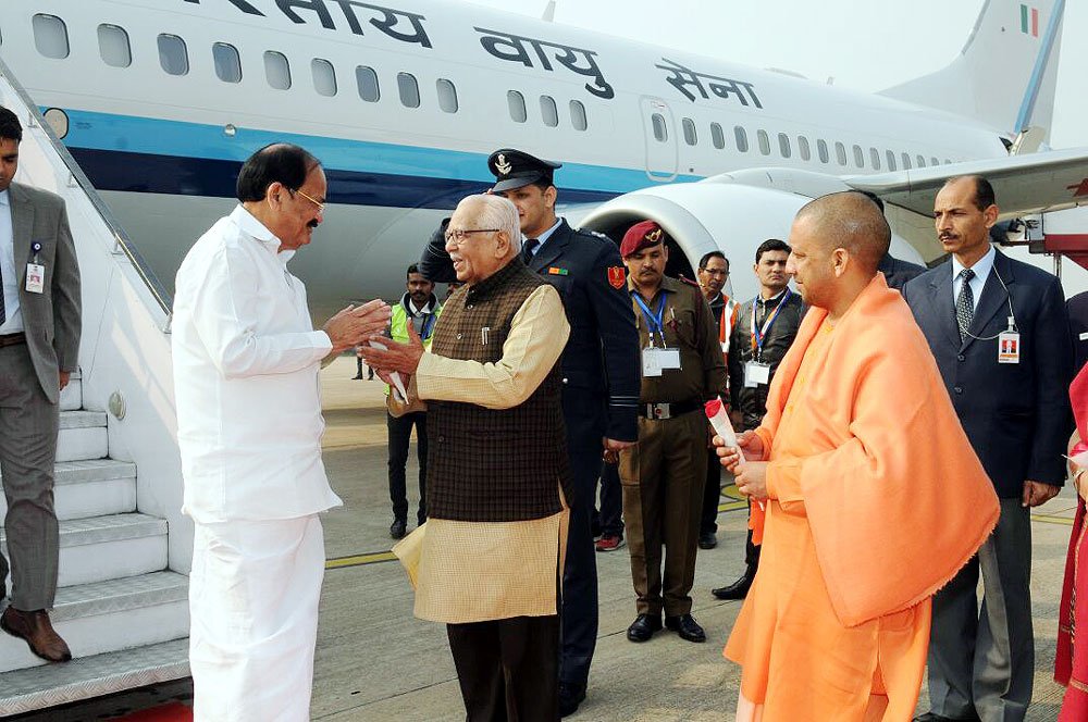 cm yogi venkaiah naidu ram naik at amausi airport