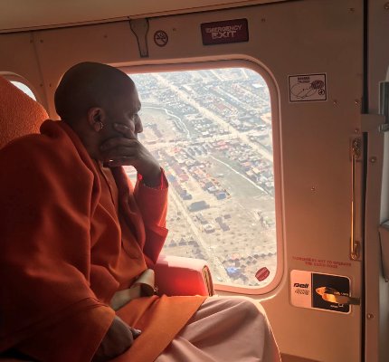 CM Yogi inspects Magh Mela by flying in air