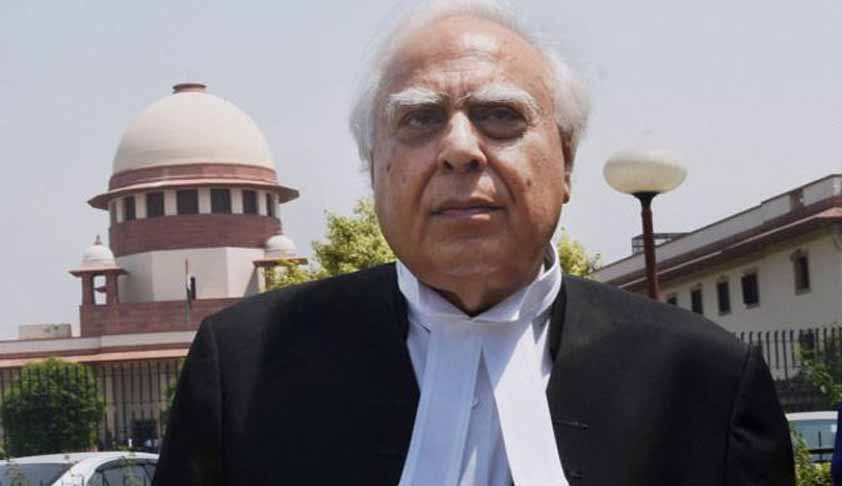 congress asks kapil sibal withdraw from babri masjid case