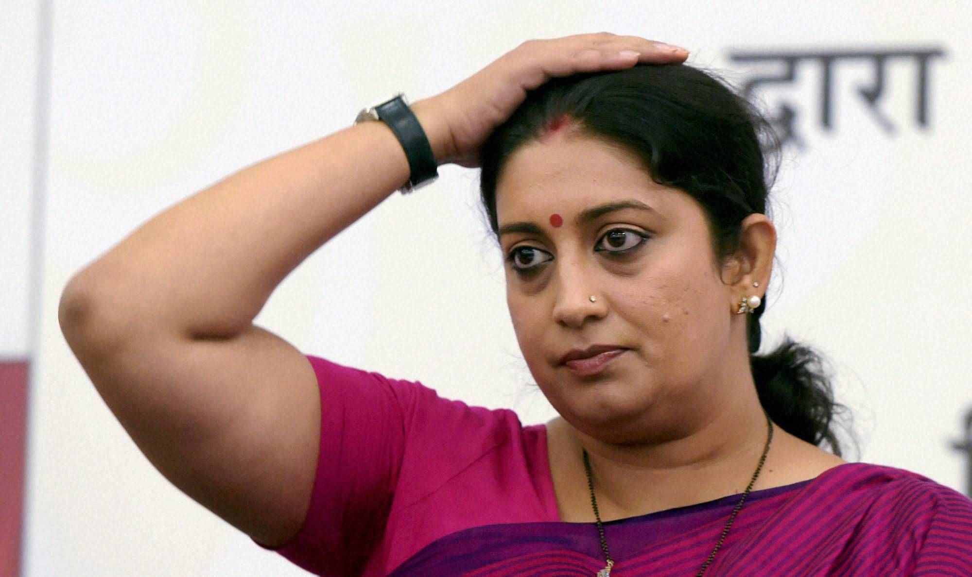 odi cabinet changes reason smriti-irani-removed-IB-ministry