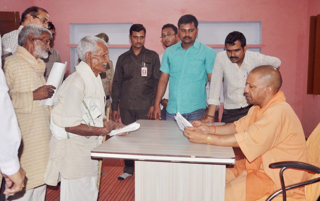 cm yogi adityantha janta darbar review meeting government schemes