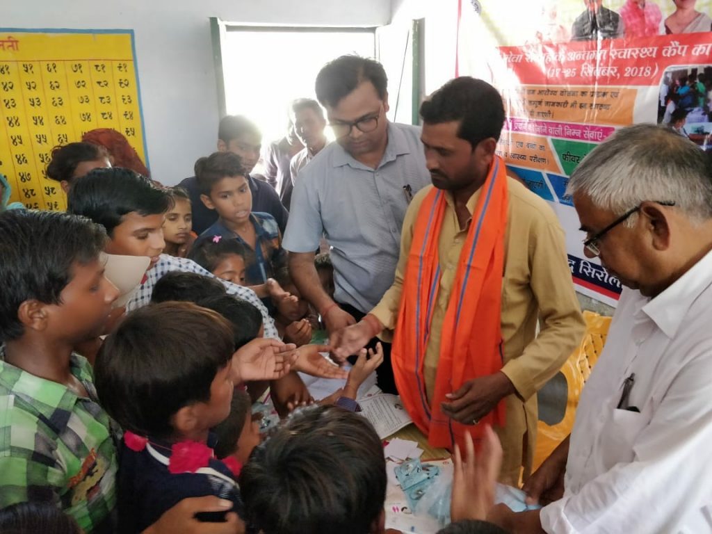 Distribution of medicines under special week health camp