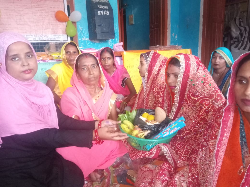 female village head conduct pregnant women baby shower program