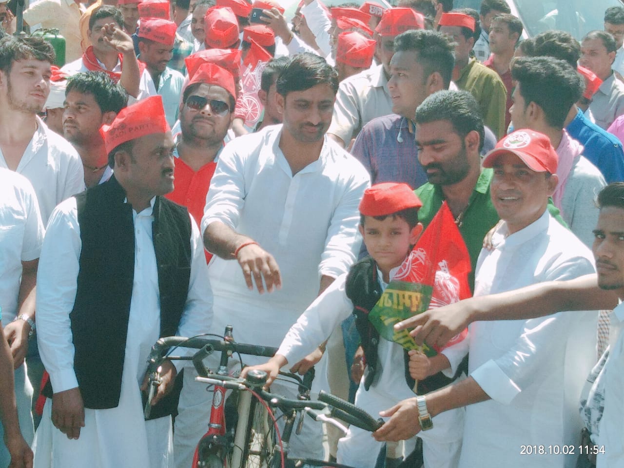 sp leaders and workers cycle rally against fuel price hike