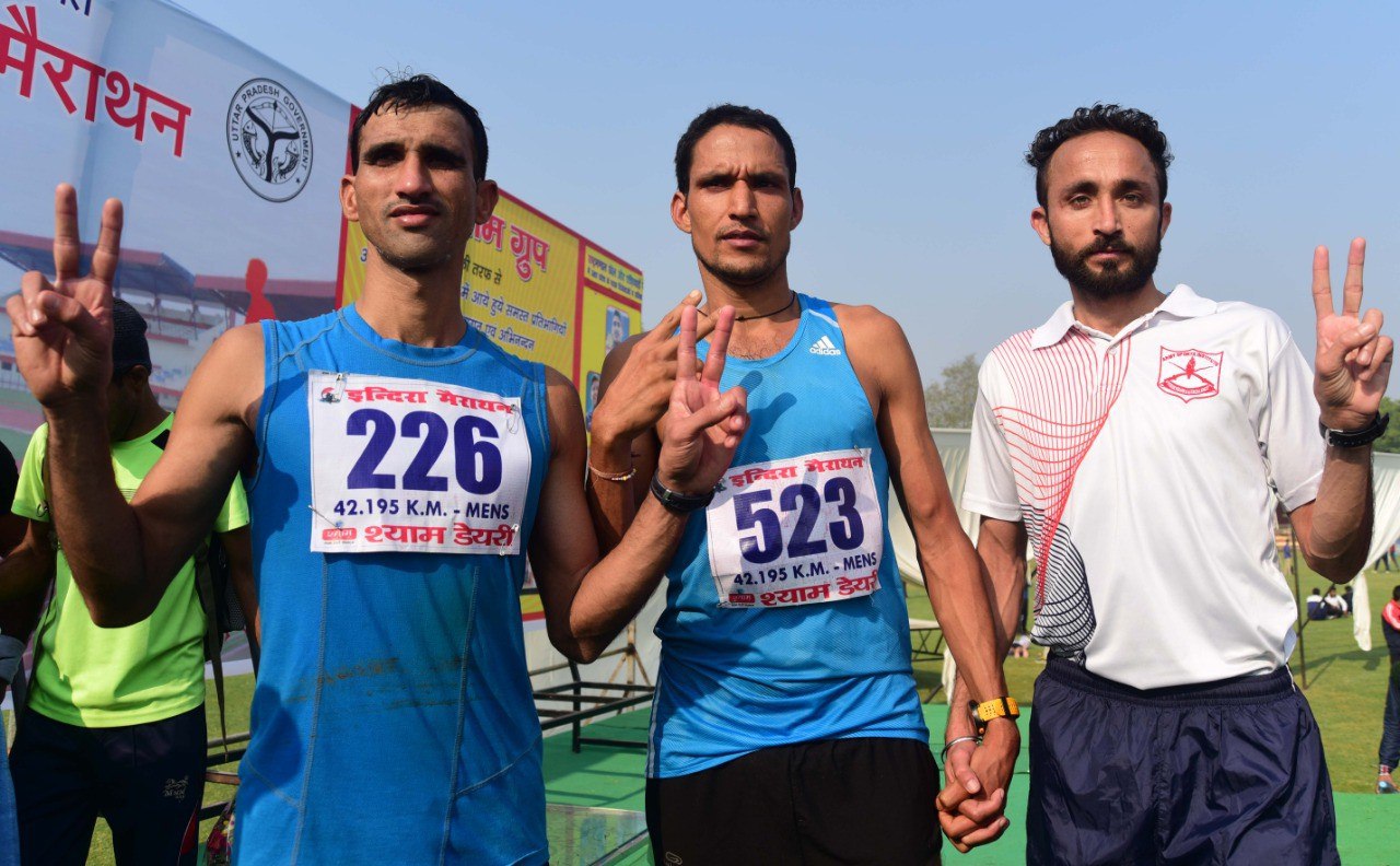 dhoni wins indira marathon men's 1