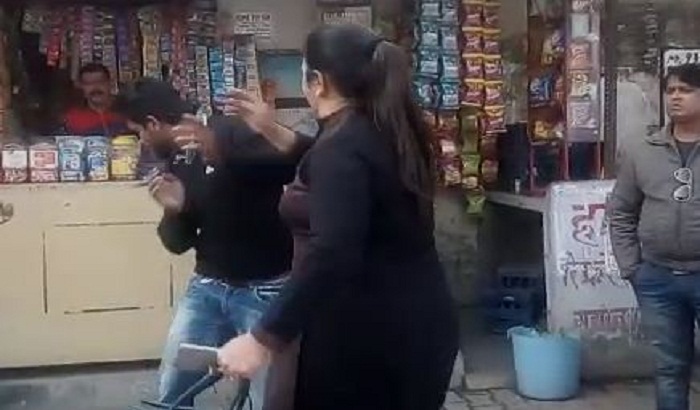 Women beat beating of young man